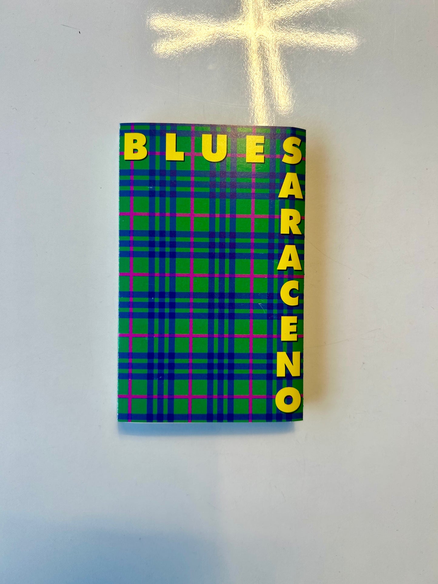 Blues Saraceno, Plaid